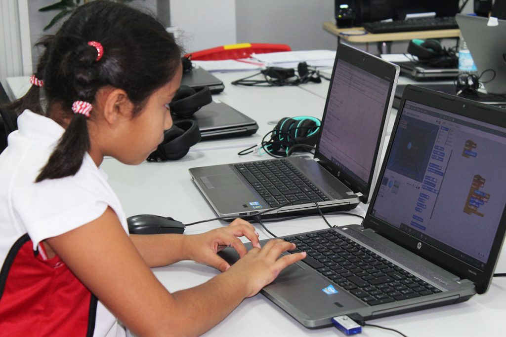 Girl-Learning-Coding-School-of-Coding